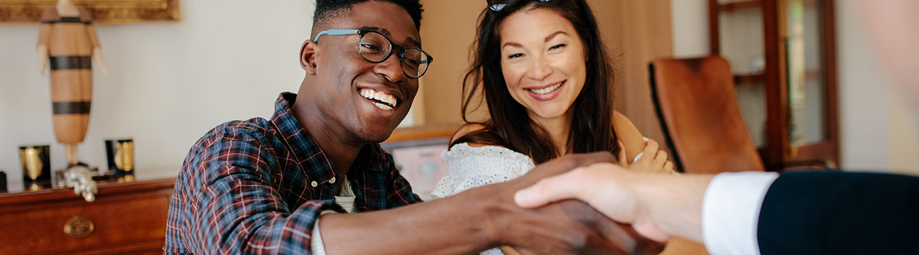 Couple finalizing their refinancing plan