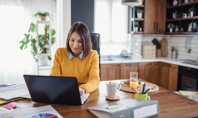 Woman taking proactive steps to protect herself against fraud.