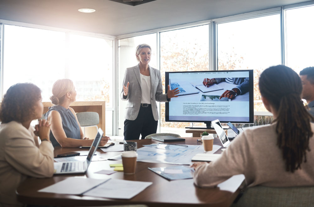 Person presenting to their team.